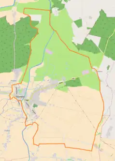 Mapa konturowa Tyszowiec, blisko centrum po lewej na dole znajduje się punkt z opisem „Dębina”