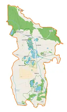 Mapa konturowa gminy Uścimów, blisko centrum u góry znajduje się punkt z opisem „Jedlanka”