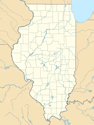 Mapa konturowa Illinois, u góry nieco na prawo znajduje się punkt z opisem „Elgin”