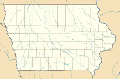 Mapa konturowa Iowa, u góry nieco na prawo znajduje się punkt z opisem „Tripoli”