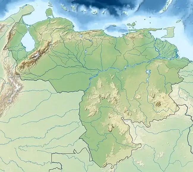 Mapa konturowa Wenezueli, blisko górnej krawiędzi nieco na prawo znajduje się punkt z opisem „La Blanquilla”