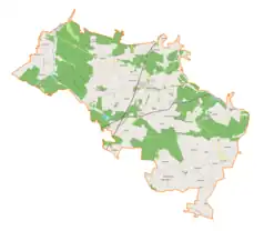 Mapa konturowa gminy Włoszczowa, po prawej nieco na dole znajduje się punkt z opisem „Przygradów”