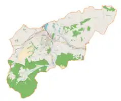 Mapa konturowa gminy Wadowice, blisko lewej krawiędzi nieco na dole znajduje się czarny trójkącik z opisem „Kłokocznik”