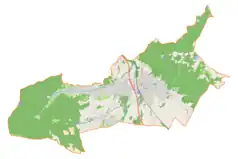 Mapa konturowa gminy Wilkowice, po prawej nieco u góry znajduje się czarny trójkącik z opisem „Rogacz”