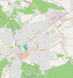 Mapa konturowa Wołomina, blisko centrum na prawo u góry znajduje się punkt z opisem „Hufiec ZHP Wołomin”