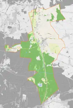 Mapa konturowa Woźnik, u góry nieco na prawo znajduje się punkt z opisem „Czarny Las”