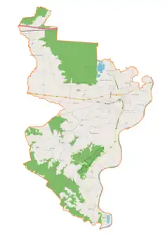 Mapa konturowa gminy Wojnicz, w centrum znajduje się punkt z opisem „Cmentarz wojenny nr 282Wojnicz-Zamoście”