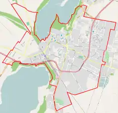 Mapa konturowa Wolsztyna, blisko centrum na lewo znajduje się punkt z opisem „Wolsztyn”