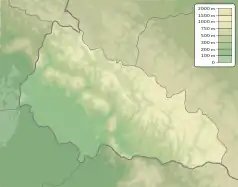 Mapa konturowa obwodu zakarpackiego, w centrum znajduje się czarny trójkącik z opisem „Stoj”