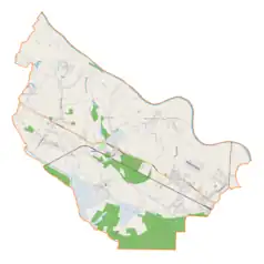 Mapa konturowa gminy Zaleszany, blisko centrum na prawo znajduje się punkt z opisem „Wólka Turebska”