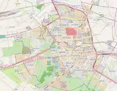 Mapa konturowa Zamościa, w centrum znajduje się punkt z opisem „Arsenał Zamojski”