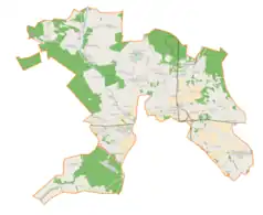 Mapa konturowa gminy wiejskiej Zduńska Wola, po prawej znajduje się punkt z opisem „Biały Ług”