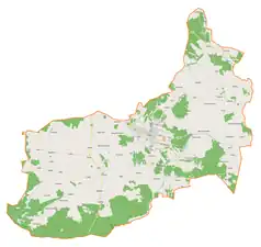 Mapa konturowa gminy Zelów, w centrum znajduje się punkt z opisem „Kościół ewangelicko-reformowanyw Zelowie”