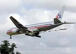 The distinctive tricolor cheatline on an American Airlines Boeing 777.