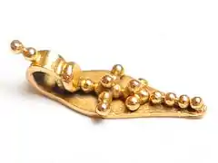 A Nasrani (Saint Thomas Christians of Kerala) gold Thaali, also known as minnu or mangalasutra elsewhere in India, sign of conjugal union worn around neck of the bride